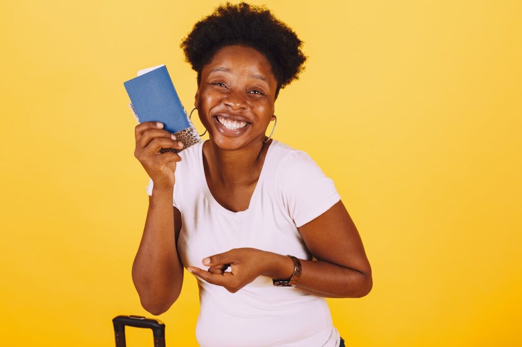 Smiling Woman in White Shirt Holding Her Passport